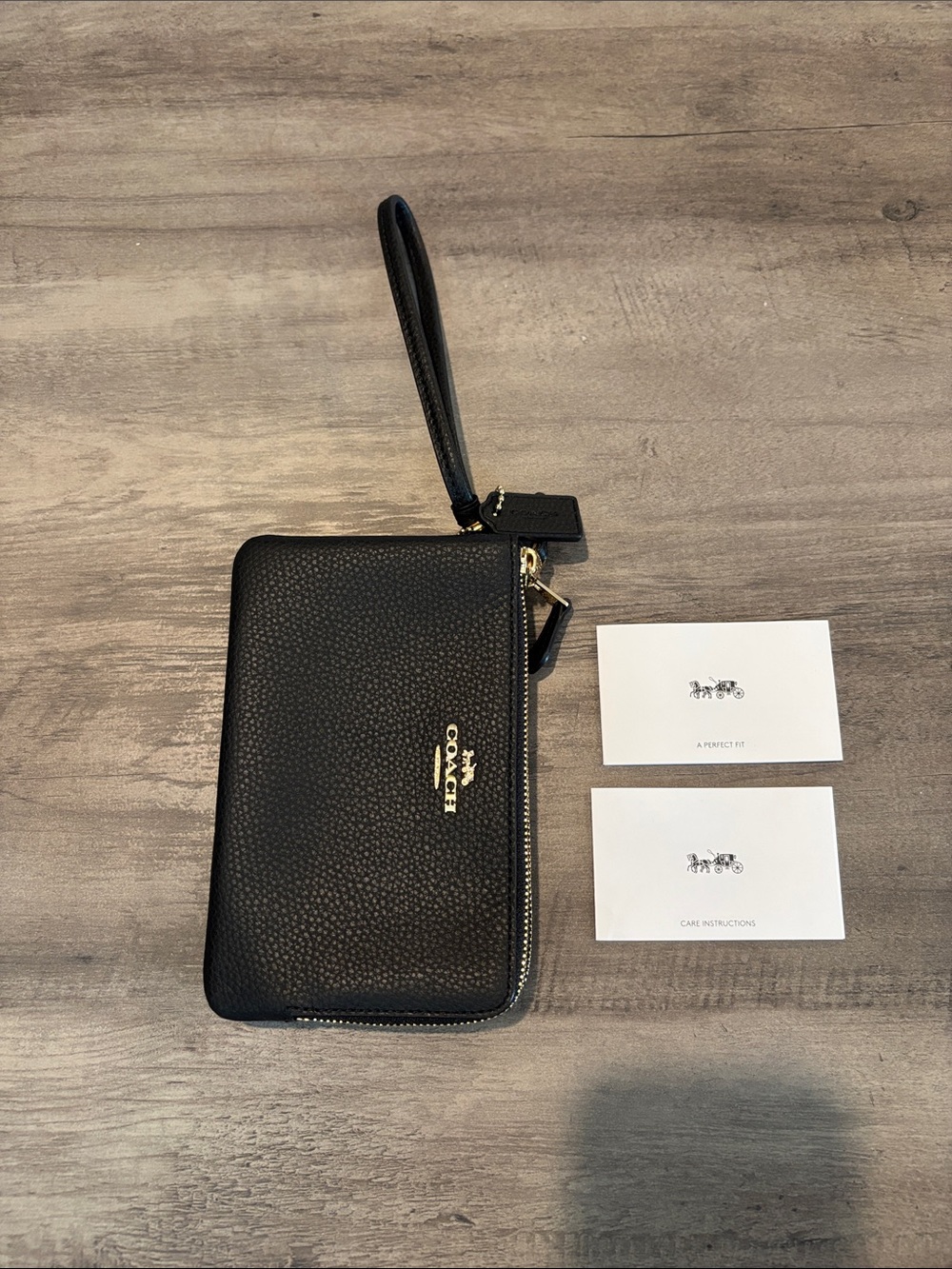 Coach Black Pebbled Leather Zip Wristlet with Gold Logo